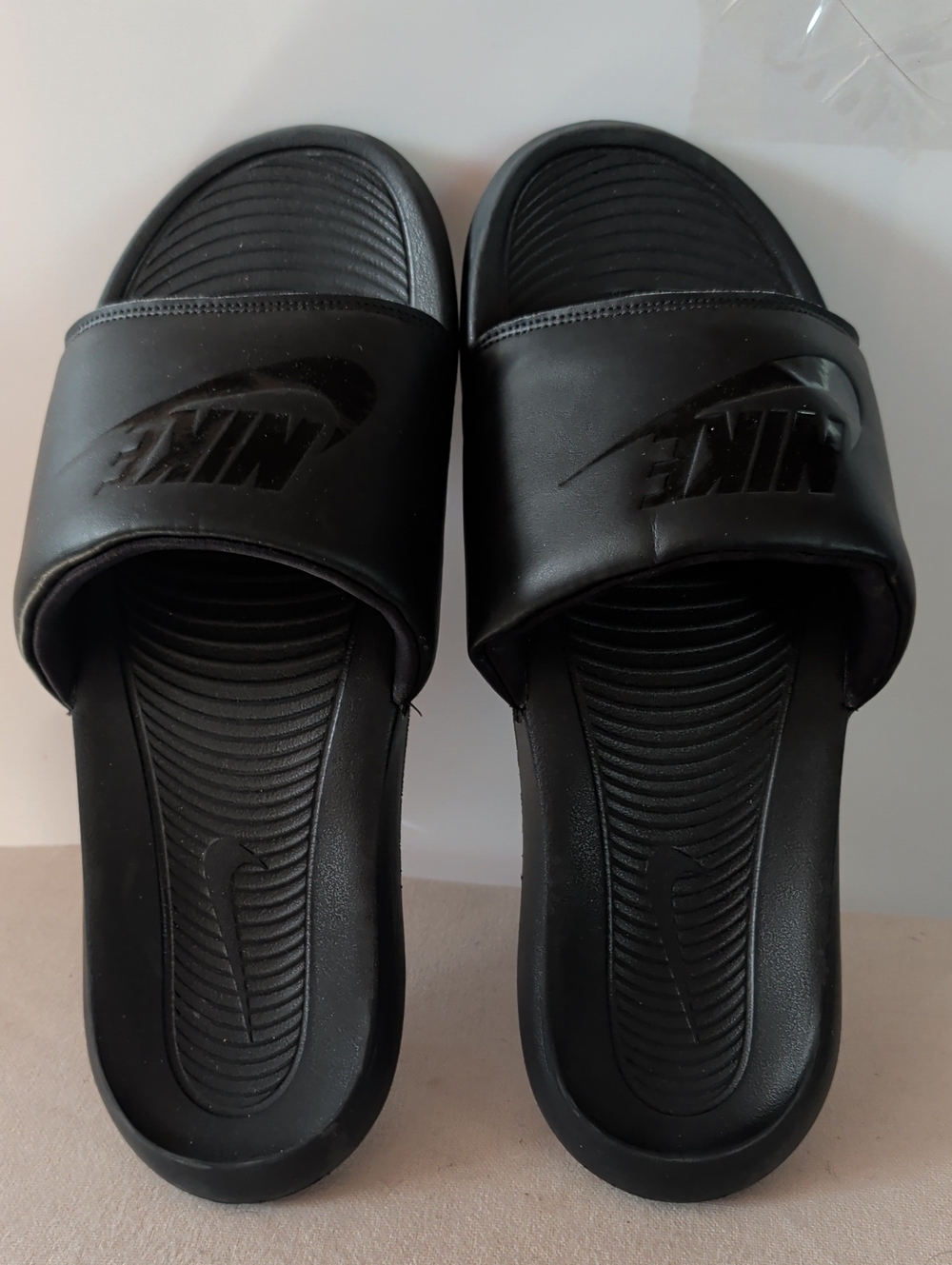 Nike Black Men's Slide Sandals with Contoured Footbed.